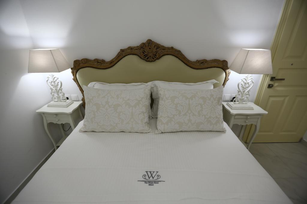 The White Suites Adámas Rom bilde